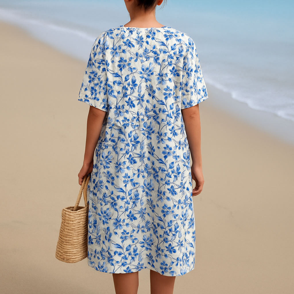 Léonie | Ivoorachtige jurk met blauwe porseleinen bloemen